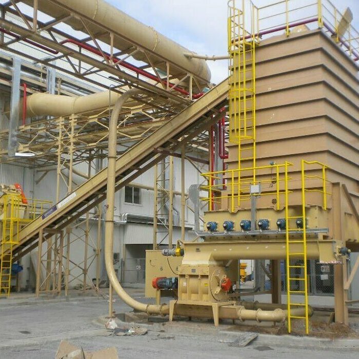 Multi-Screw-Surge-Bin-landscape-8d9fd268d13109c5c8e3b4cdfb333bbd-60d1172b4b479 Live bottom bin and metered feed system with air-supported belt conveyor and collector screw designed by CIL Ltd for particleboard plant in Vietnam.